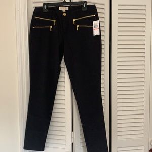 Michael Kors Black Skinny pants with Gold zipper detailing. Size 10